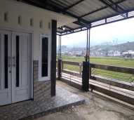 Rumah 2 kamar 1 bed depan TV